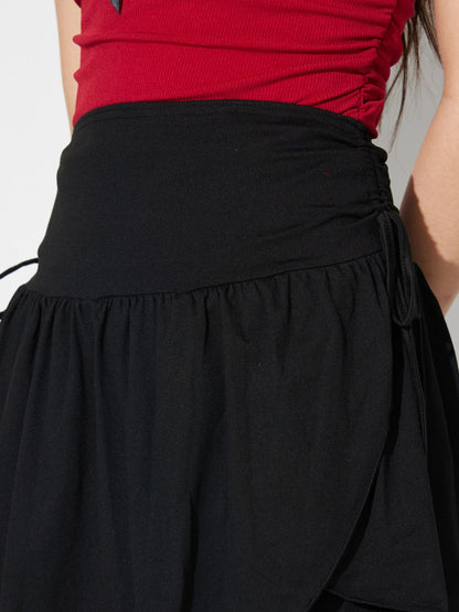 Side Tie Asymmetric Hem Mini Skirt